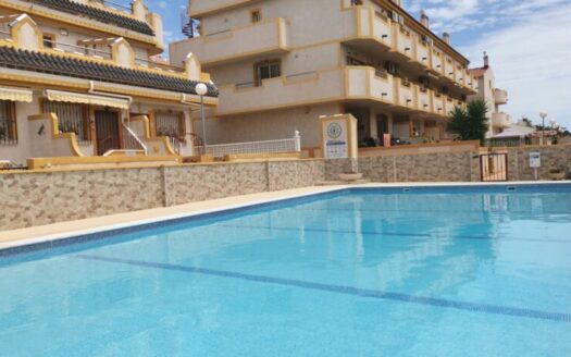 South Facing, large two bedroom ground floor apartment in Playa Flamenca